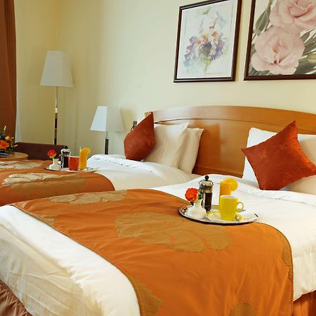 Golden Tulip Sharjah Aparthotel Exterior photo