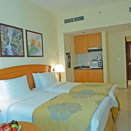 Golden Tulip Sharjah Aparthotel Exterior photo