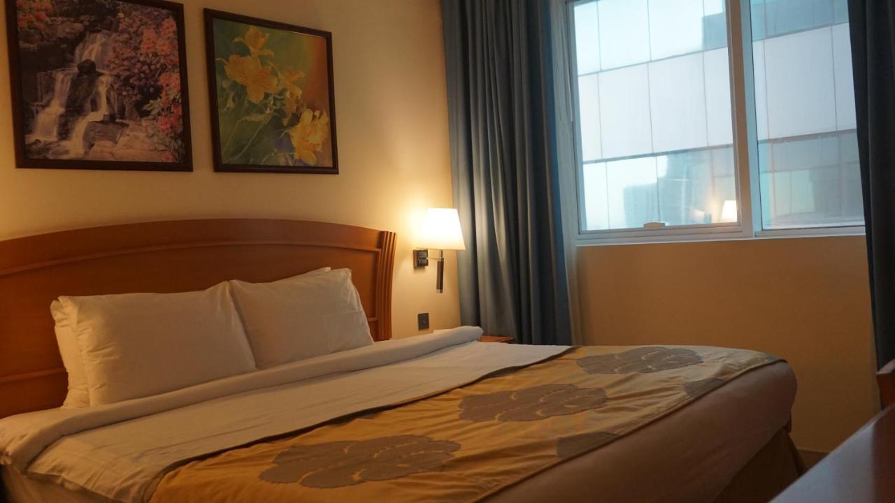 Golden Tulip Sharjah Aparthotel Exterior photo