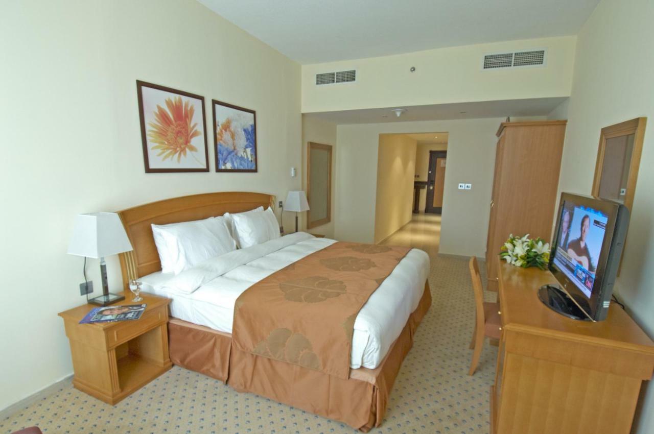 Golden Tulip Sharjah Aparthotel Exterior photo