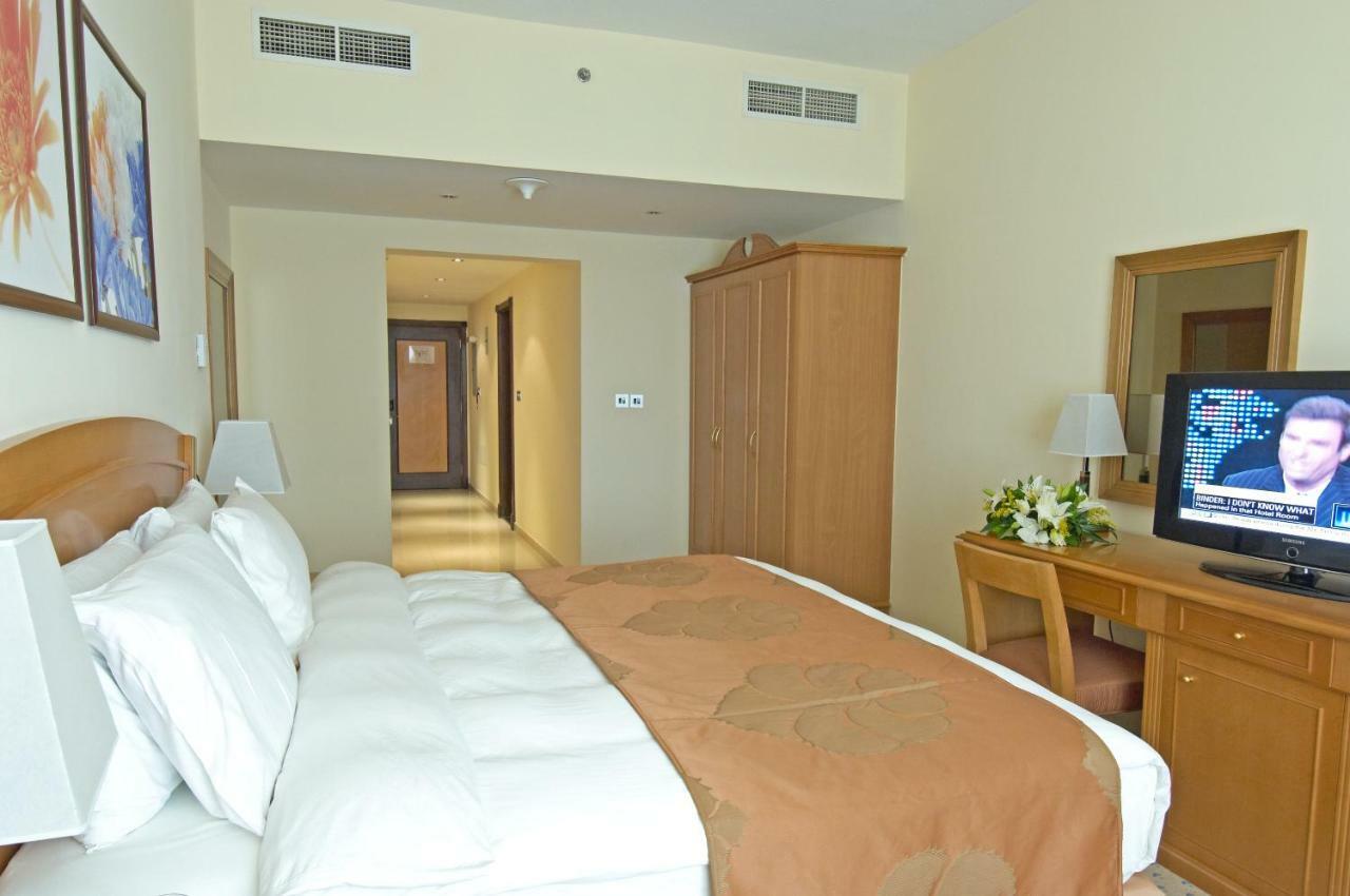 Golden Tulip Sharjah Aparthotel Exterior photo
