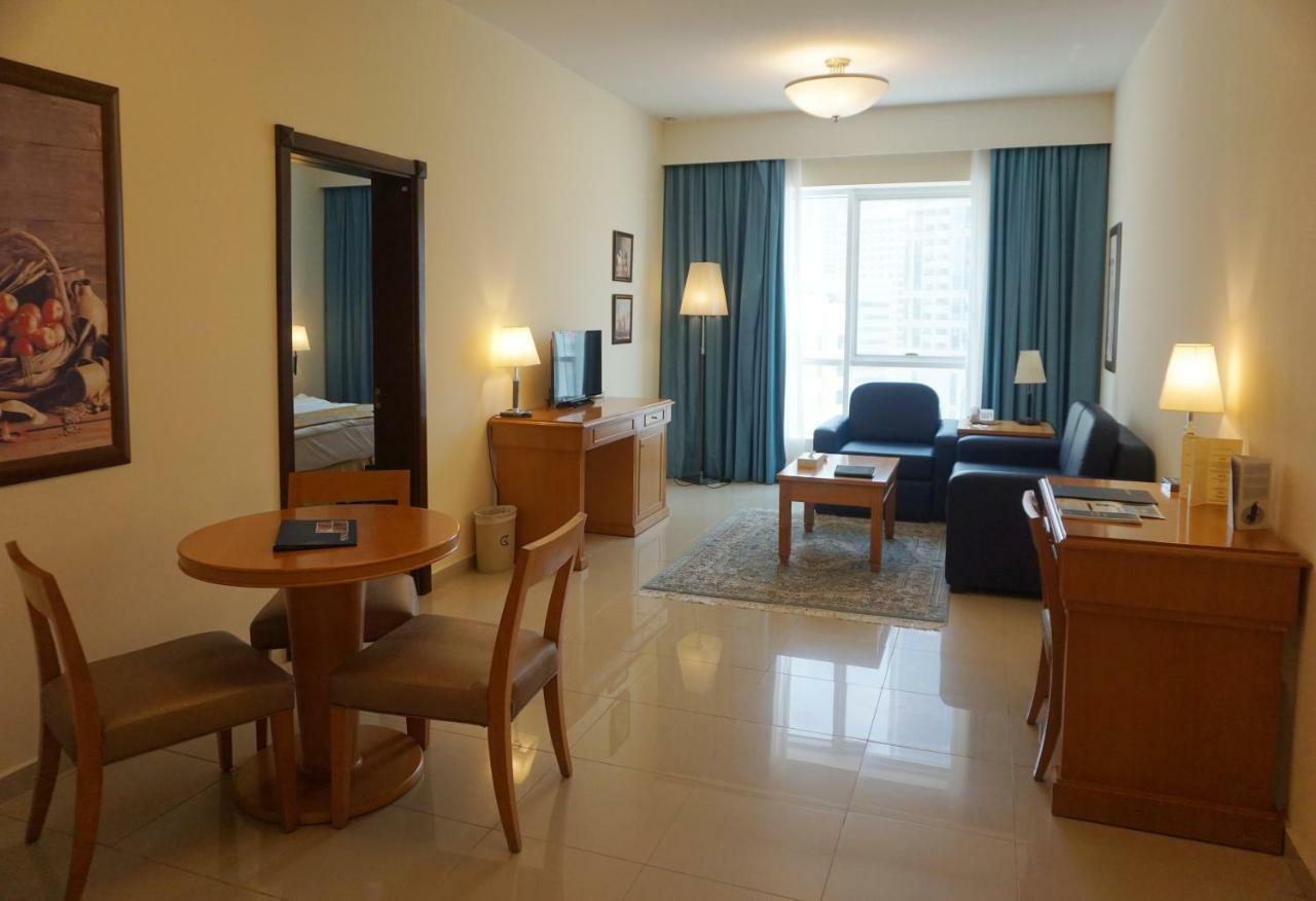 Golden Tulip Sharjah Aparthotel Exterior photo
